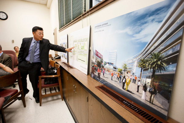 Hanns Lee, senior vice president of Lowe Enterprises Real Estate Group, shows the media renderings of his company's proposed real estate development site across the street from the new San Francisco 49ers stadium, during a press conference on Oct. 25, 2013 at Santa Clara City Hall. (Dai Sugano/Bay Area News Group)