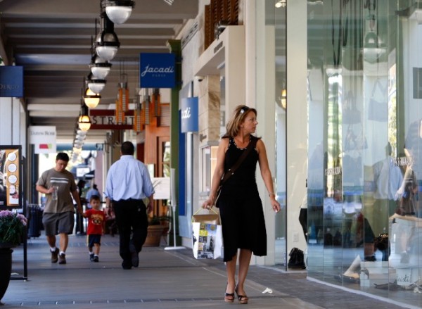 SAN JOSE, CA - AUGUST 29:  Shoppers walk through the high-end Santana Row shopping area August 29, 2007 in San Jose, California. The U.S. Census Bureau released its newest population survey today and named San Jose, California as the richest city in the United States with a population of 500,000 or more. The median household income in San Jose is $74,000. San Francisco, California and San Diego, California were second and third followed by Seattle, Washington and Las Vegas, Nevada.    (Photo by Justin Sullivan/Getty Images)